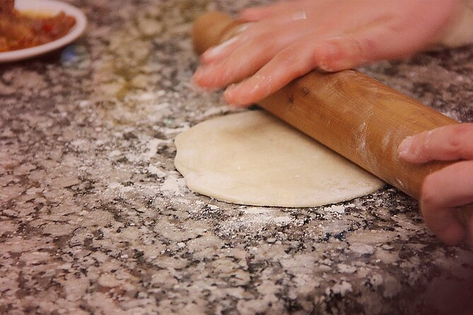 BA: Empanadas and Alfajores Cooking Experience in Palermo - Folding empanadas the Argentine way