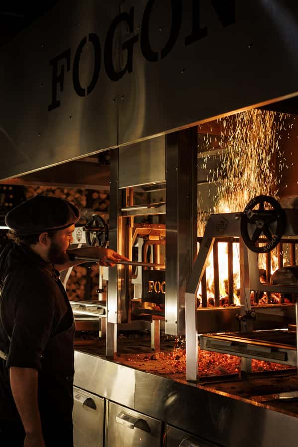 Buenos Aires: 9-Course Argentine Meat Tasting at Fogón Asado - Arriving at the fire in Palermo