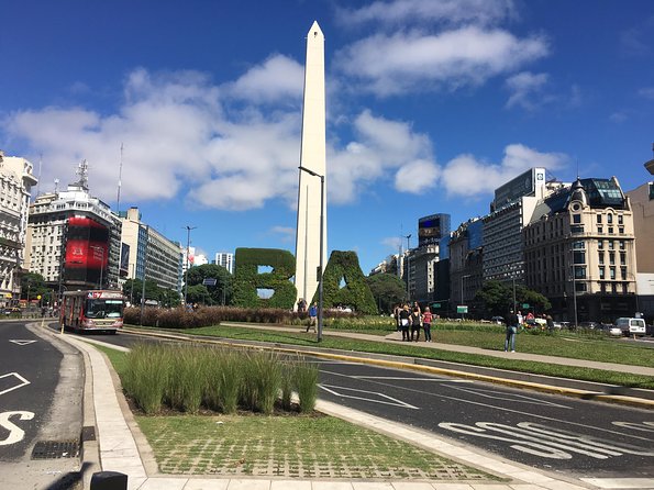 Buenos Aires Walking Tour with Local Guide and Optional Rooftop - San Telmo: cobblestones, antiques, and an old market