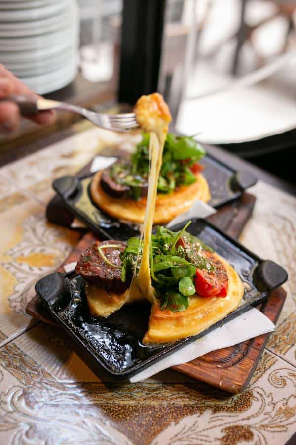 San Telmo: Historical Guided Tour with Street Food & Drinks - Walking through old San Telmo