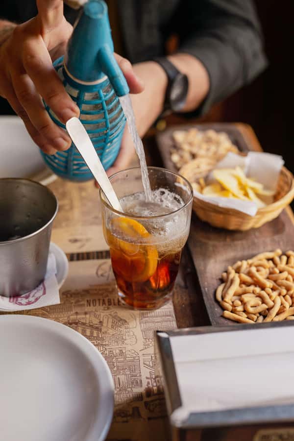 San Telmo: Historical Guided Tour with Street Food & Drinks - Ending with a traditional Argentine dessert